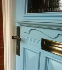 Close up of our 1930s door's frieze & accessories
