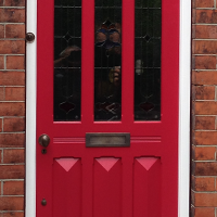nine panel wooden front door in the edwardian style