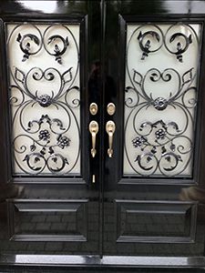 Georgian door with ornate grilles