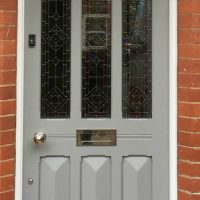 Edwardian entrance door painted in Farrow and Ball's Manor House Grey - a very modern colour